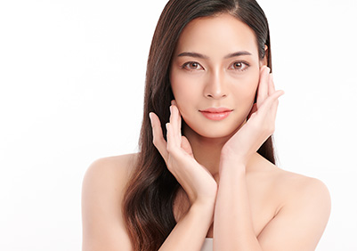 Pretty Asian woman looking at camera